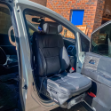 swivel car seat rotating outside vehicle for wheelchair transfer