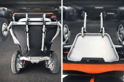 Heavy Duty Foldable Power Wheelchair – Easy Car Boot Loading | 30km Range Foldable power wheelchair tilted onto support wheels for easy car boot loading