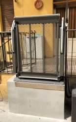 Outdoor Wheelchair Platform Lift: Compact, Durable, and Easy to Install Low-rise wheelchair platform lift bridging entry steps at a residential porch