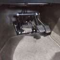 Three pedals dual control driving school system with brake, accelerator and clutch pedals installed in manual training vehicle