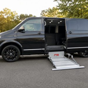 Side entry wheelchair accessible van with automatic cassette ramp